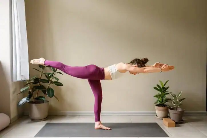 Woman doing Yoga exercise Rowley Regis to help with toning the body. 
